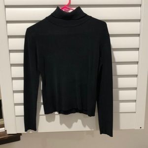 Slightly worn black turtleneck